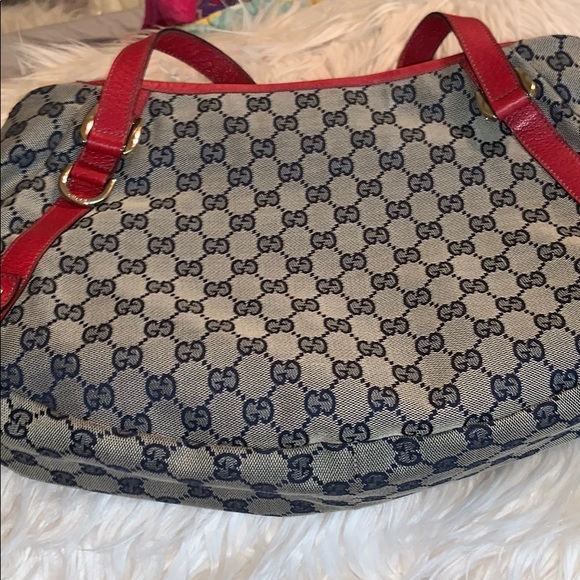 Gucci Handbags - Gucci Navy GG mono w. Red straps & gold hardware